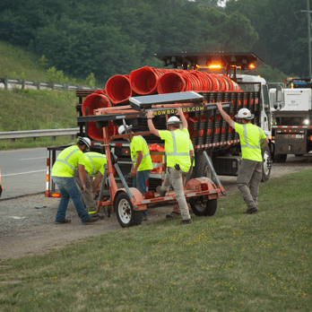 Group of Workers installing traffic equipment